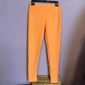 Orange Pinched leggings NWT! XL